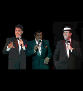 the Rat Pack a trio of men one italian male, one black male and one british male.